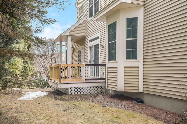 exterior space featuring a wooden deck