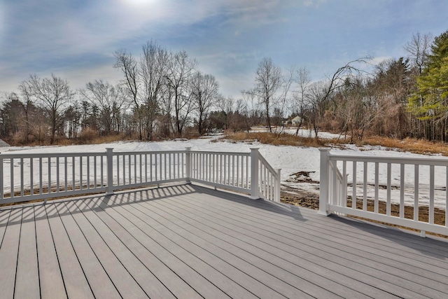 view of snow covered deck