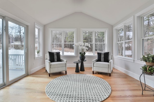 sunroom with vaulted ceiling