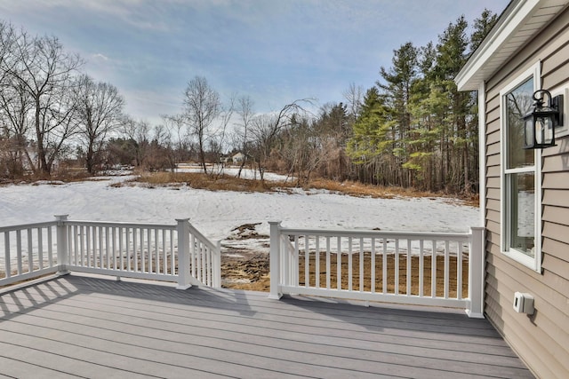 view of snow covered deck