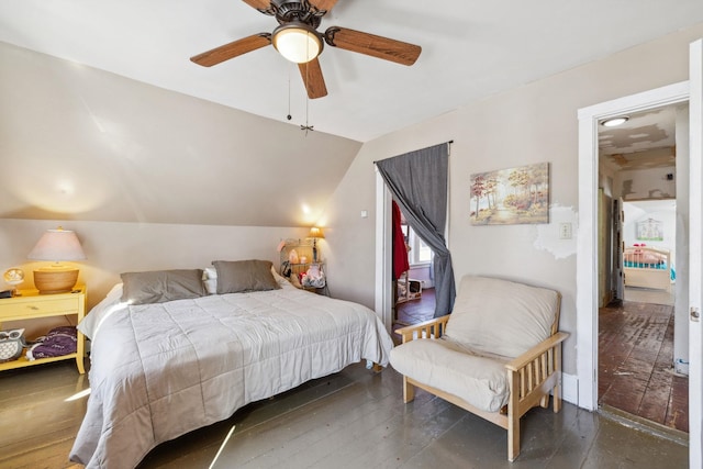 bedroom featuring lofted ceiling and a ceiling fan