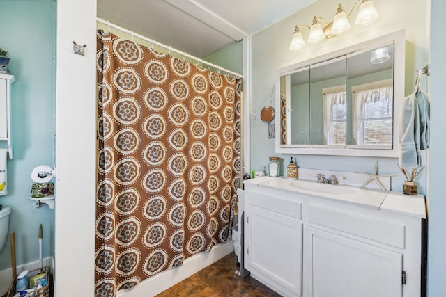 bathroom featuring vanity and a shower with shower curtain