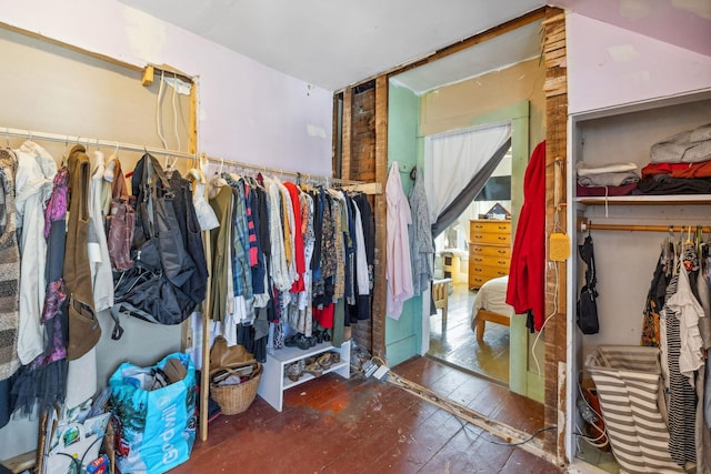 spacious closet featuring hardwood / wood-style flooring