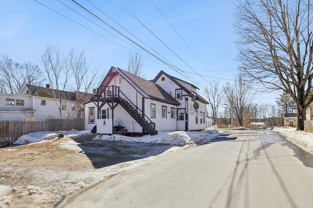 view of front of property with fence