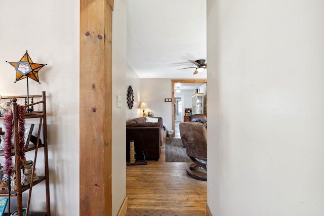 hall with wood finished floors