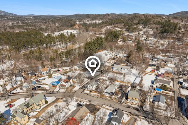 birds eye view of property with a residential view and a mountain view