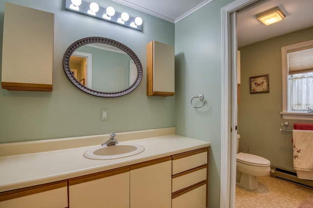 bathroom with baseboard heating, ornamental molding, vanity, and toilet