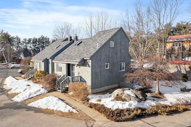 view of front of property featuring a chimney