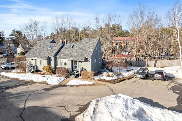 view of front of house with fence