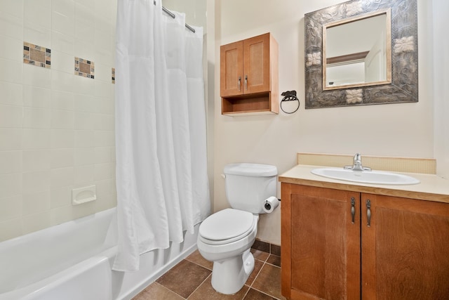 bathroom with tile patterned floors, shower / bath combo with shower curtain, toilet, baseboards, and vanity