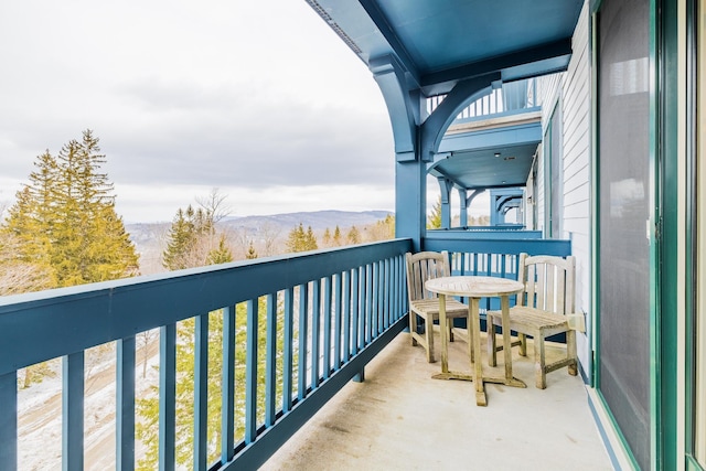 balcony featuring a mountain view