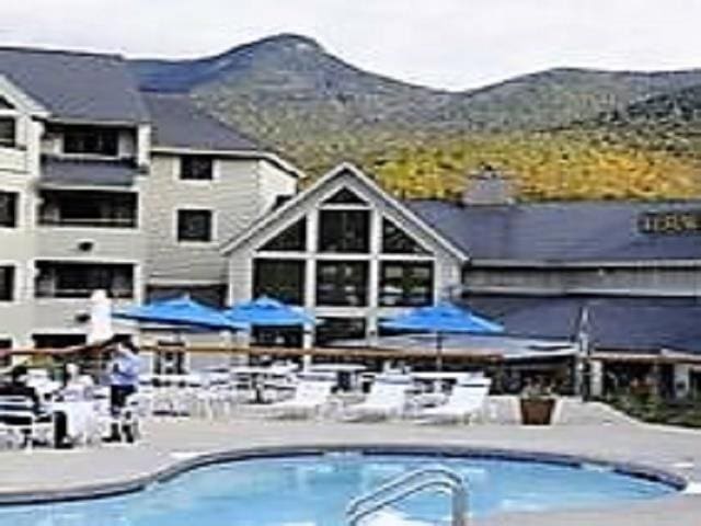 view of pool with a mountain view