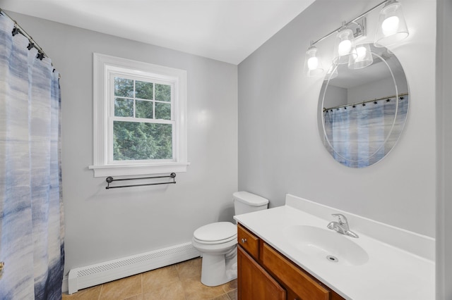 bathroom featuring tile patterned floors, toilet, a baseboard heating unit, baseboards, and vanity