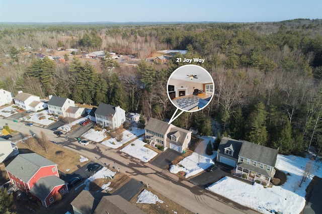 drone / aerial view with a view of trees