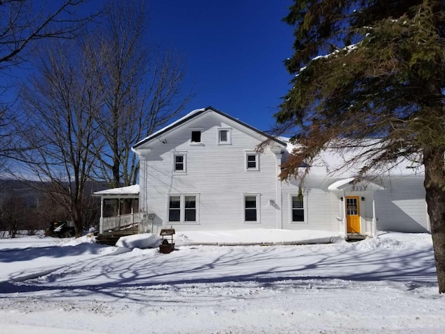 view of snow covered property