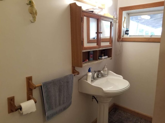 bathroom featuring baseboards