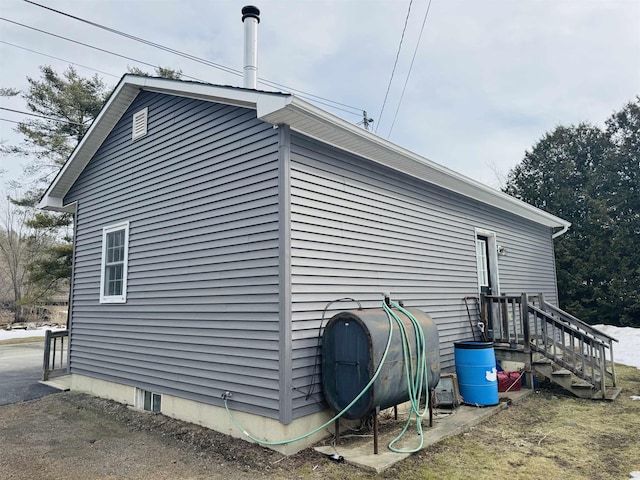 view of home's exterior featuring heating fuel