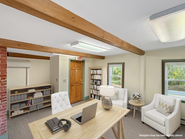office space with beamed ceiling, a healthy amount of sunlight, a baseboard heating unit, and carpet floors