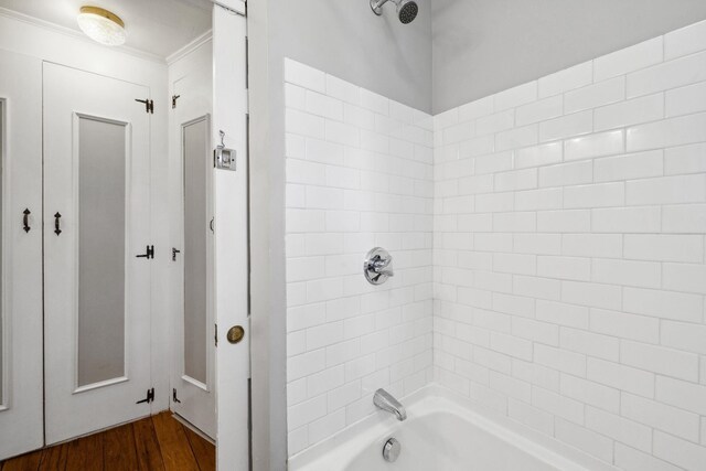 51 E Derry Rd, Derry, NH 03038 - full bathroom featuring wood finished floors and washtub / shower combination