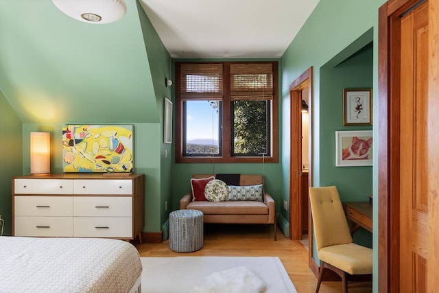 bedroom with light wood finished floors