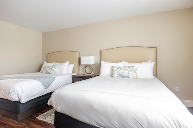 bedroom featuring wood finished floors