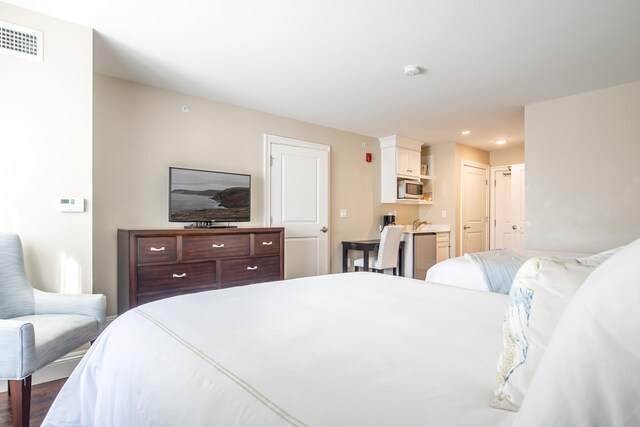 bedroom featuring a closet and visible vents