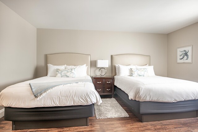 bedroom featuring wood finished floors