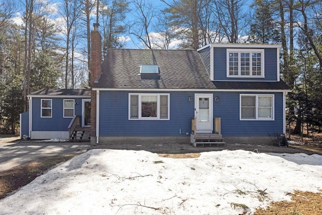 9 Sands Ter, Barnstead, NH 03225 - view of front of house featuring entry steps, a chimney, and roof with shingles