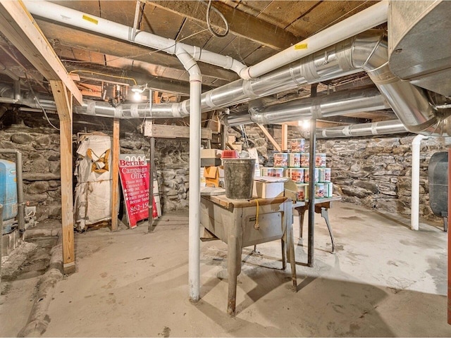unfinished below grade area featuring heating fuel