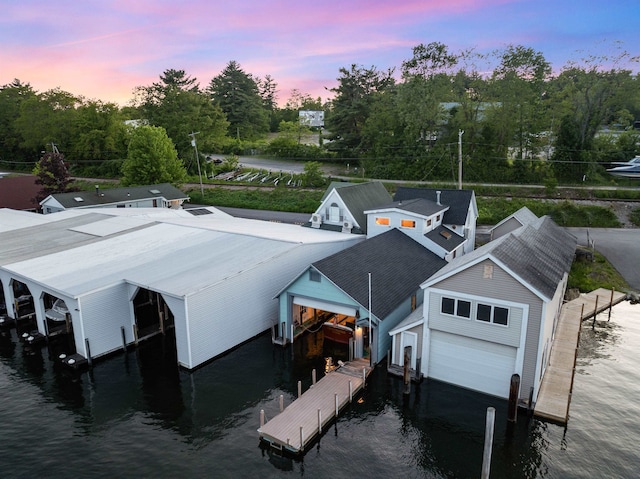 48 Channel Ln, Laconia, NH 03246 - dock area with boat lift, a water view, and view of scattered trees