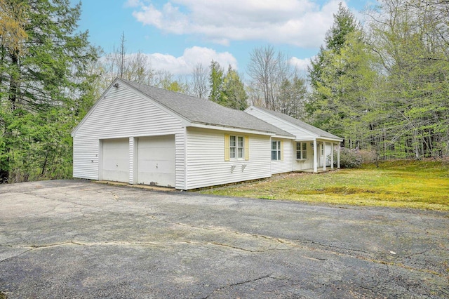 321 Rolling Ridge Rd, Bartlett, NH 03812 - view of side of property featuring a shingled roof
