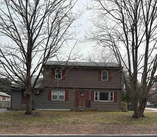 view of front of home with a front lawn