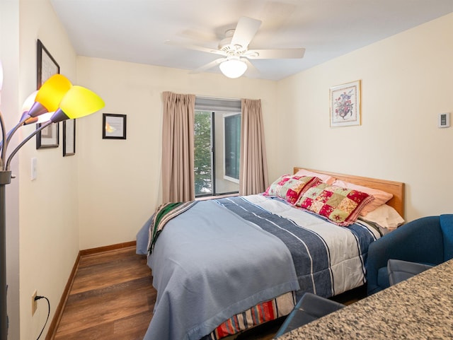 133 E Mountain Rd Unit 3C17, Killington, VT 05751 - bedroom featuring baseboards, wood finished floors, and a ceiling fan