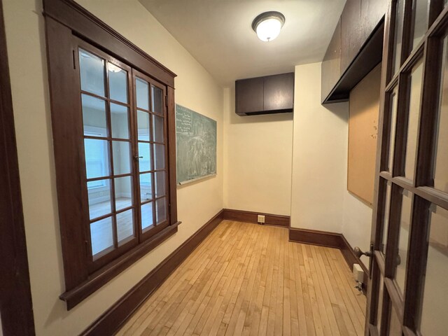 42 Elm St, Claremont, NH 03743 - below grade area featuring light wood finished floors and baseboards