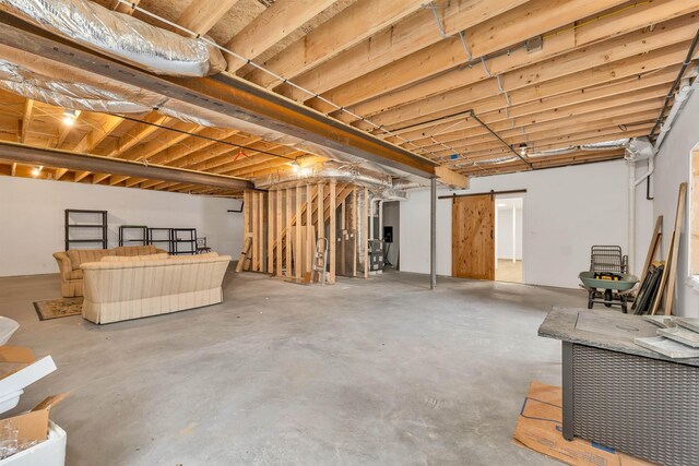 7 John Hardie Way, Chichester, NH 03234 - unfinished basement with a barn door