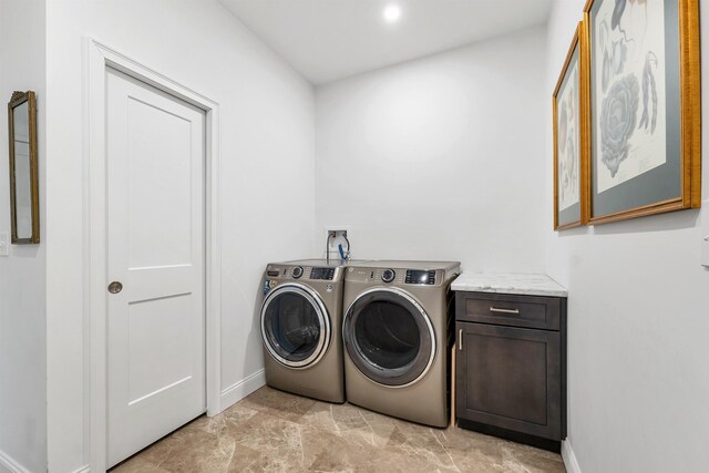 7 John Hardie Way, Chichester, NH 03234 - laundry area featuring washer and clothes dryer, cabinet space, and baseboards