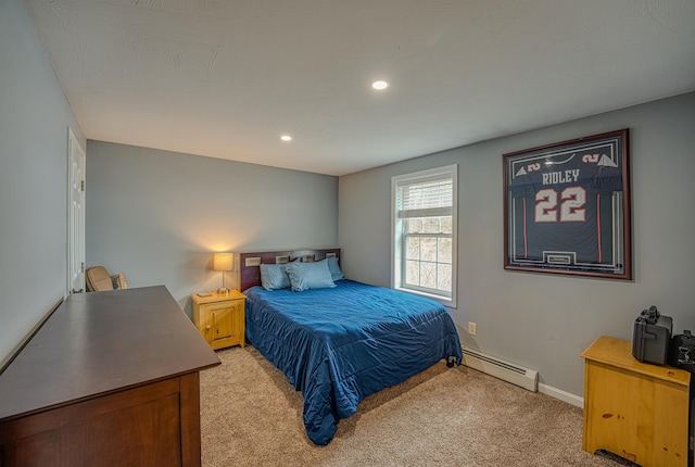 bedroom with a baseboard radiator, light colored carpet, baseboards, and recessed lighting