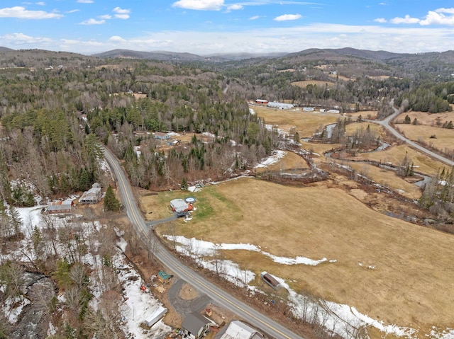 aerial view with a forest view and a mountain view