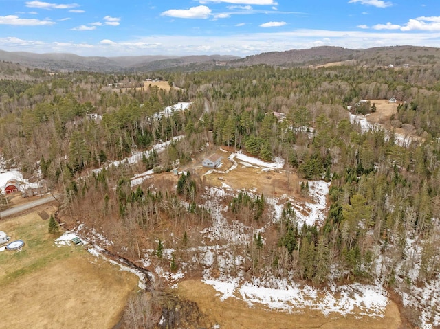 aerial view with a mountain view and a view of trees