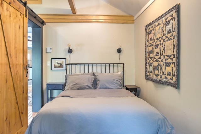 59 Wilson Pond Rd, Swanzey, NH 03431 - bedroom with lofted ceiling and a barn door