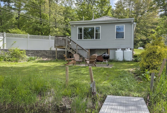 59 Wilson Pond Rd, Swanzey, NH 03431 - back of property featuring stairs and a deck