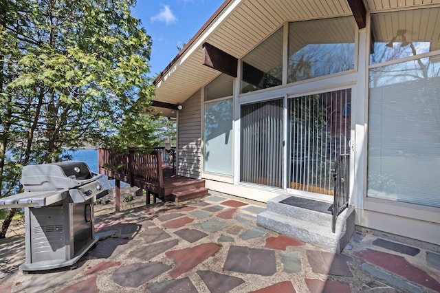 view of patio featuring a deck and area for grilling