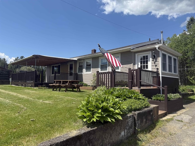 2779 River Rd, Lemington, VT 05903 - rear view of property with a deck, a yard, and a chimney