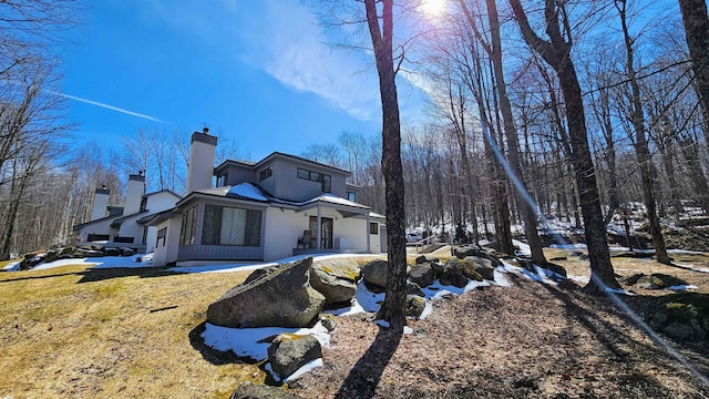rear view of house with a chimney