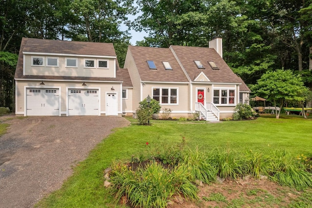 13 Ocean Circuit Dr, York, ME 03902 - view of front of property with a chimney, driveway, and a front lawn
