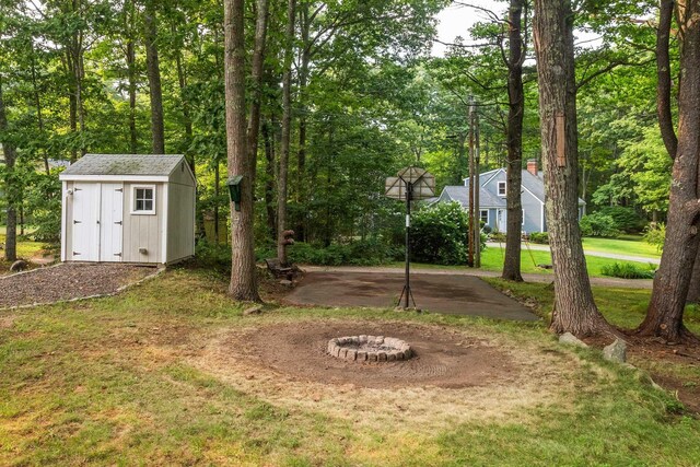 13 Ocean Circuit Dr, York, ME 03902 - view of yard featuring a storage unit and an outdoor structure