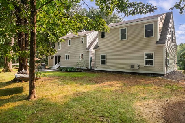 13 Ocean Circuit Dr, York, ME 03902 - rear view of house with a lawn, ac unit, and entry steps