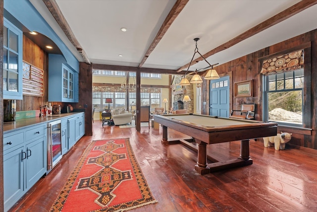 444 Tin Shanty Rd, Shrewsbury, VT 05738 - rec room with wine cooler, pool table, beam ceiling, wood walls, and dark wood-style floors