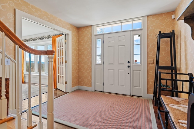 444 Tin Shanty Rd, Shrewsbury, VT 05738 - entryway featuring a wealth of natural light, wallpapered walls, and baseboards