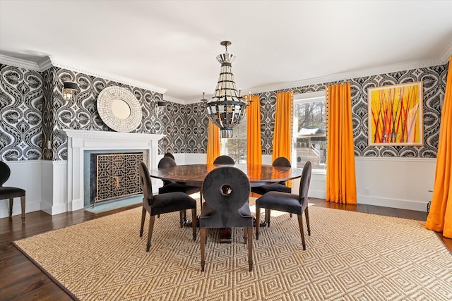 444 Tin Shanty Rd, Shrewsbury, VT 05738 - dining space featuring baseboards, wallpapered walls, ornamental molding, and an inviting chandelier